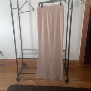 tight stretchy flare pants. tan size small/medium